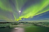 Northern Lights & Moon over Jökulsárlón glacier lake Iceland