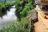 Canoeing on Vezere river and cave house Perigord France  ; The canoe is a good way to visit the region ever on the Vezere to discover all the troglodyte sites, on the Dordogne from Limeuil to la Roche-Gageac or on the Dronne at Brantome.