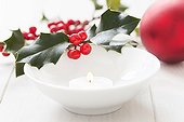 Holly branches with berries Candle and Christmas Ball 