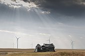 Wind and farm in ruins Montana USA