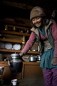 Woman serving tea Zanskar Ladakh India 