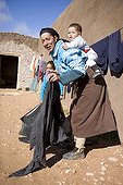 Extending the laundry woman carrying her son Morocco