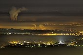 Fog sheet and Bugey nuclear power plant at night France