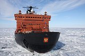 Russian nuclear icebreaker Franz Joseph Archipelago ; The Russian nuclear icebreaker "Let Pobedy 50" (50 years of Victory) breaking the ice towards the Geographic North Pole, photo taken from helicopter; 
