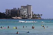 Swimming on the beach at Waikiki Beach in Honolulu Hawaii 