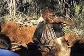 Aboriginal lady eating an honey ant in Australia ; Warlpiri Aborginal community of Alice Spring