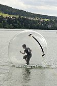 people in Waterball Lake Saint-Point France ;  