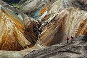 Hikers in a volcanic landscape in Iceland