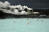 Bath in the warm waters of Blue Lagoon Iceland  ; The discharge of hot water from power plant are used for spa, a place is very popular in Iceland near Reykjavik.
