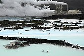 Bath in the warm waters of Blue Lagoon Iceland  ; The discharge of hot water from power plant are used for spa, a place is very popular in Iceland near Reykjavik.