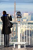 Photographer on the terrace of the Tour Montparnasse Paris ;  