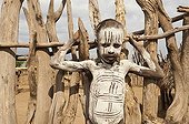 Karo boy with facial and body paintings, Omo river valley, Southern Ethiopia, Africa