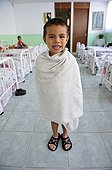 Boy, wrapped in a towel, dormitory of an orphanage, Queretaro, Mexico, North America, Latin America