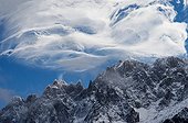 Lenticular clouds over the Aiguilles of Chamonix Alpes ; Clouds of bad weather 