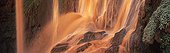 Cascades Ouzoud Piedmont Central High Atlas Morocco ; red water by heavy rain