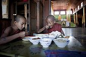 Young monks eating their breakfast Nyaungshwe monastery