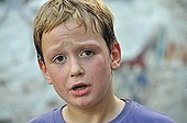 Sweaty 8-year-old boy, football yard in Cologne, North Rhine-Westphalia, Germany, Europe