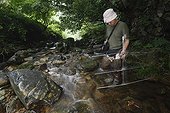 Observation of a Japanese Giant Salamander in a river Japan ; Prof. Sumio Okada focus his research on the habitat of salamanders, he wants to understand what's make a stream a good one for reproduction or not and a good place for larveas to grow up. With radio tracking help he can know the mouvement of the animals.