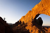 Photographer and sandstone arch Arches NP USA ; sector "Windows" 