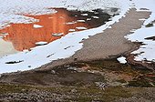 Reflection hills and ice at midnight Cap Greg Greenland 