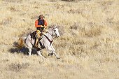 Cowboy in the prairie The Hideout Guest Ranch Wyoming USA ; Tom Bercher