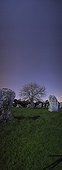Menhir alignment of Kerzerho under moonlight Bretagne France