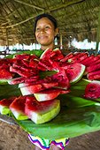 Embera woman and sliced ??watermelon Chagres NP Panama 