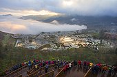 Tourists and Rice terraces of Hani people - Yuanyang China ; Ailao mountains
