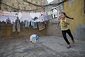 Palestinian girl playing ball - Camp Shatila Lebanon ; Rayan, 8 Palestinian in Lebanon