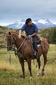 Gaucho sitting on horse ready for a ride - Patagonia Chile