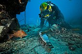 Diver cleaning an anode  - Aquarius Reef Base Florida ; Umbilical diver cleaning an anode 