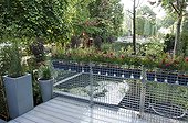 Terrace and pound on an urban garden ; Landscaper: Pierre-Alexandre RISSER<br><br>