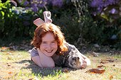 Girl with her dwarf rabbit