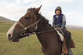 Kyrgyz boy on his horse - Kyrgyzstan
