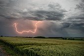 Cloudy flash in the back of a storm front - France 