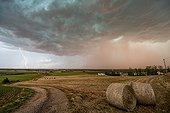 Thunderstorm and lightning above the evening countryside - France ; Architecture rarely seen cover. 