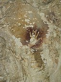 Hand negative - Cave Sumpang bita Sulawesi Indonesia  ; In October 2014, these paintings have been recognized as one of the oldest in the world (- 39 000 years) by a team of US researchers. 
