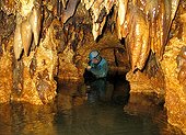 Exploring a cave - Karst Maros Sulawesi Indonesia ; In October 2014, the cave paintings found in caves in the limestone massif have been recognized as one of the oldest in the world (- 39 000 years) by a team of US researchers.
