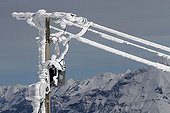 Ice electric pylon - Bauges Alpes France