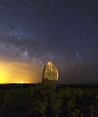 Milky Way and Megalith - Isle of Hœdic Brittany France  ; A large menhir stands on one of the highlights of Hoëdic Island. Its silhouette stands among the stars of Sagittarius, while to the right, Scorpio rises with Saturn above its pincers.
