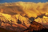 Storm clouds at sunset on the Mont Blanc Massif - France ; Summer Storm in the evening, seen from the Upper Giffre (Desert Platé)