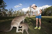 Girls and Eastern Grey Kangaroo - Queensland Australia