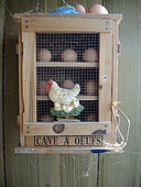 Egg box on an hen house in a garden