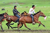 Horse Racing at the Lapste - Tibet China ; Equestrian Festival Lapste <br>Every year, in june, the villages of a each valley are gathering together for horse races.