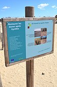 Pannel Restauration of the dunes  - Island of Oleron France  ; Sign, dune restoration after storm Xynthia