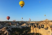 Turkey. Ballooning in Cappadocia. Every morning or so, around one hundred balloons are taking off near Goreme for one hour flight upon the best places of Cappadocia. Here the village of Uchisar.