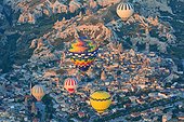 Turkey. Ballooning in Cappadocia. Every morning or so, around one hundred balloons are taking off near Goreme for one hour flight upon the best places of Cappadocia. Here the village of Goreme.