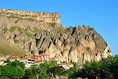 Turkey. Cappadocia. The Ihlara valley. The village of Selime is dominated by a huge cliff full of troglodyte houses.