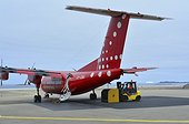 Denmark. Greenland. West coast. Air Greenland plane on the air strip of the town of Aasiaat.