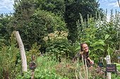 Young woman in a garden in agroecology